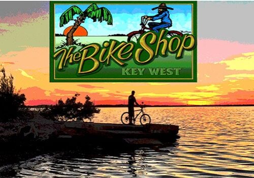 The Bike Shop Logo of Sunset at the water's edge with a person standing next to a bike.